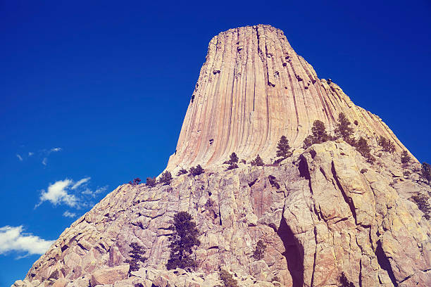 Vintage toned photo of Devils Tower, top attraction in Wyoming State, USA.