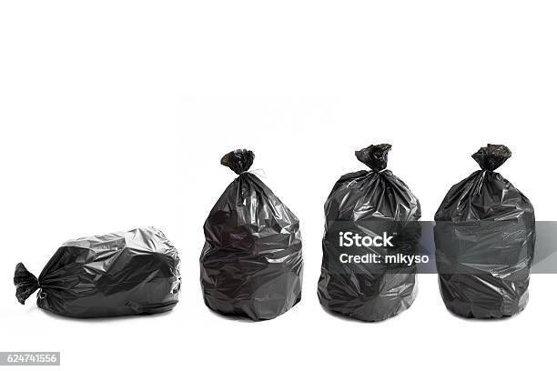 Four Garbage Bags Stock Photo - Download Image Now - Garbage, Garbage Can, Basket