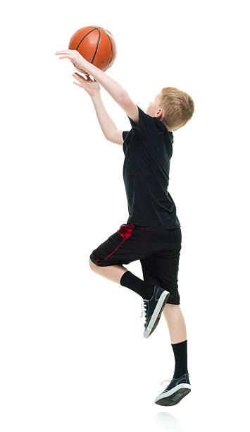istock Little boy playing basketball 624742342