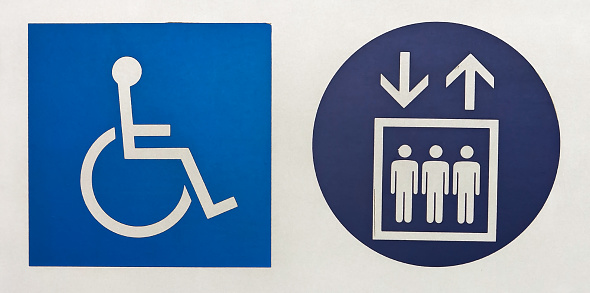 International symbol of access and elevator symbol in brazilian subway station