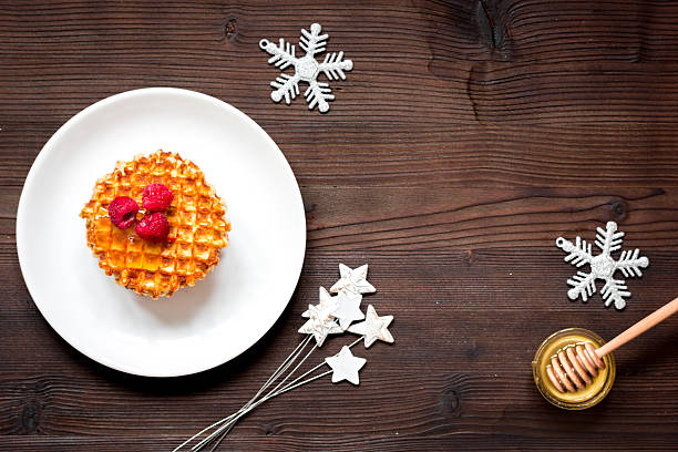 istock Christmas breakfast with waffles top view 624742824