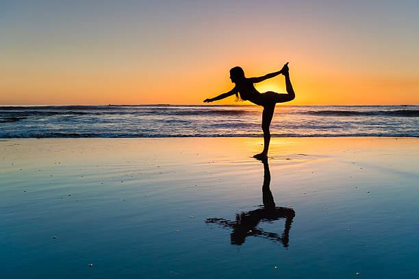 istock Women Sunset Yoga 624745292