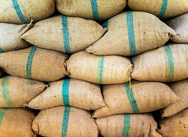 istock Rice in sacks stacked up a lot 624745482