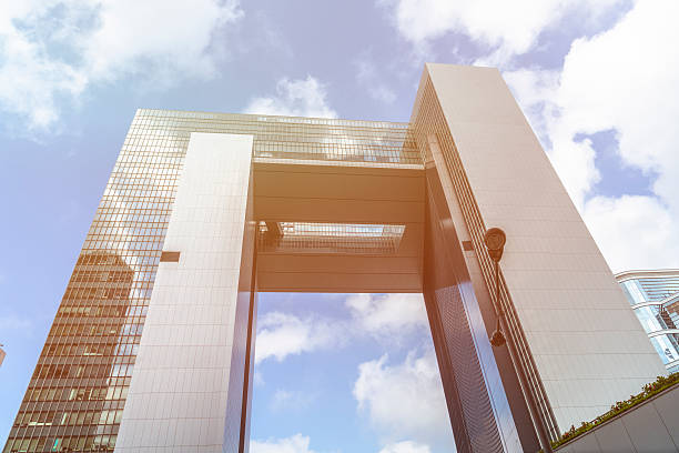istock low angle view of modern highrise under sky 624748668