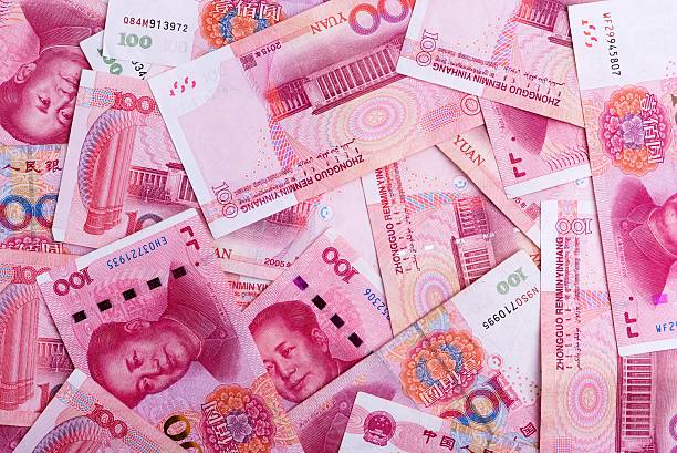 istock Background of many Chinese 100 RMB Yuan notes 624749142
