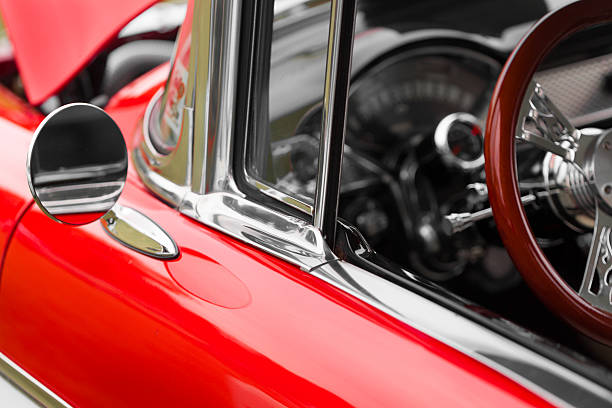 istock Wing mirror of a red shiny classic vintage car 624750352