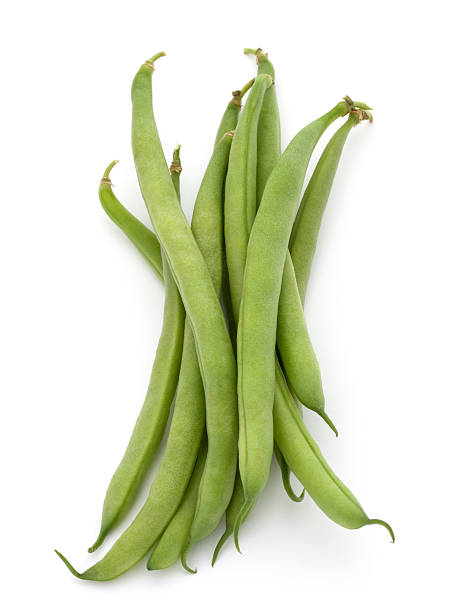 istock Green beans handful isolated on white background cutout 624750586