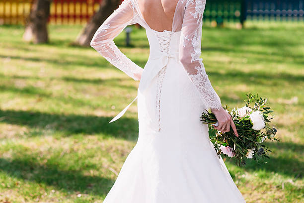 istock Unrecognizable bride hurry to groom, outdoor 624751486