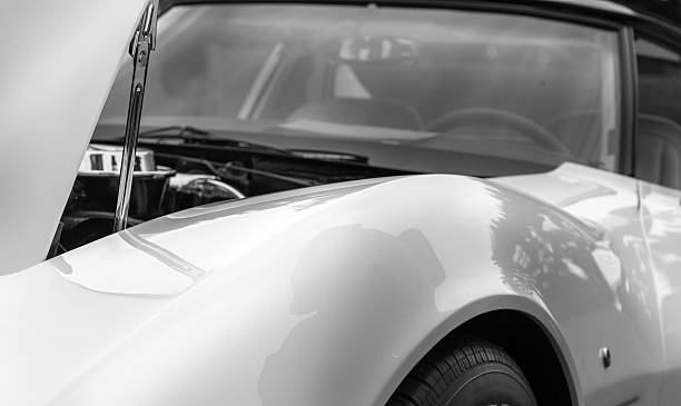 istock Open bonnet of a white shiny classic vintage car 624751772