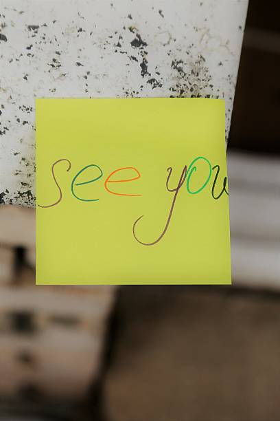 istock message see you on a yellow sticker 624752484