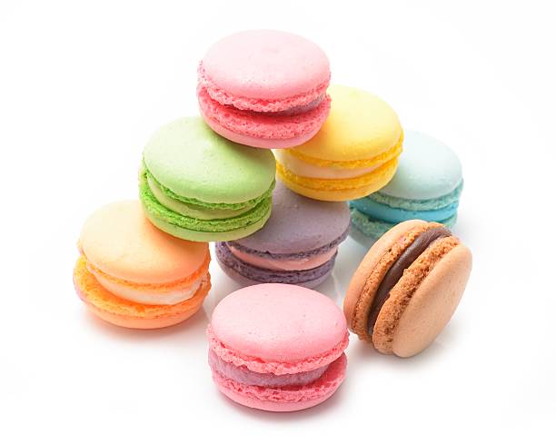 istock Sweet and colourful french macaroons or macaron on white background 624771532