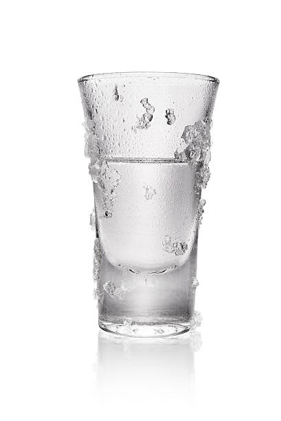 glas wodka-isoliert - shot glass stock-fotos und bilder