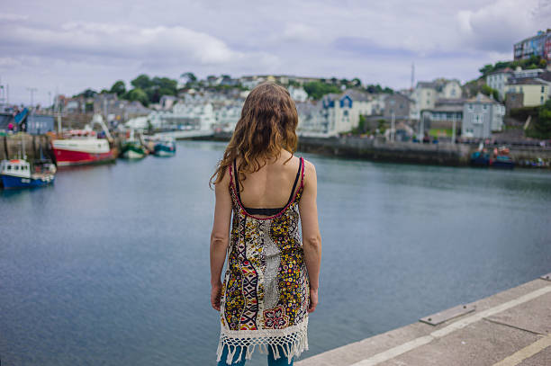 istock Woman relaxing in harbor 624853002