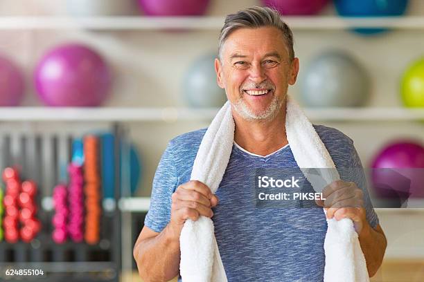 Senior Man In Health Club Stock Photo - Download Image Now - Exercising, Men, Senior Adult