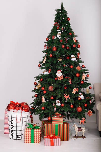 istock Christmas tree with gifts 624856016