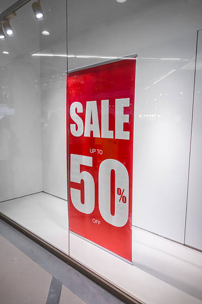 istock Discount sign in a shop window 624856260