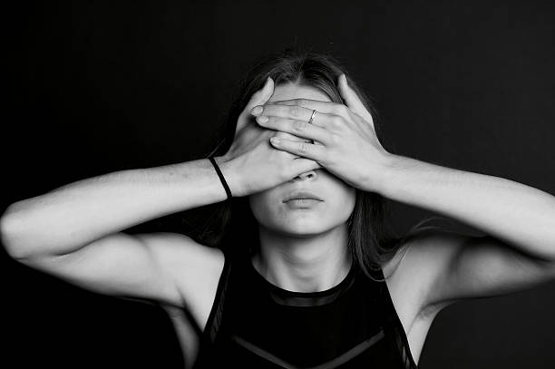 istock See no evil. The girl closes your eyes. 624856378