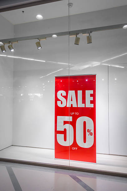 istock Discount sign in a shop window 624856502