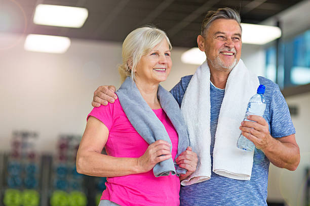 istock Senior Couple in the Gym 624856936