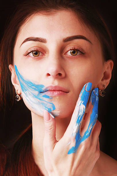 istock Bright beautiful girl with art colorful make-up 624872690