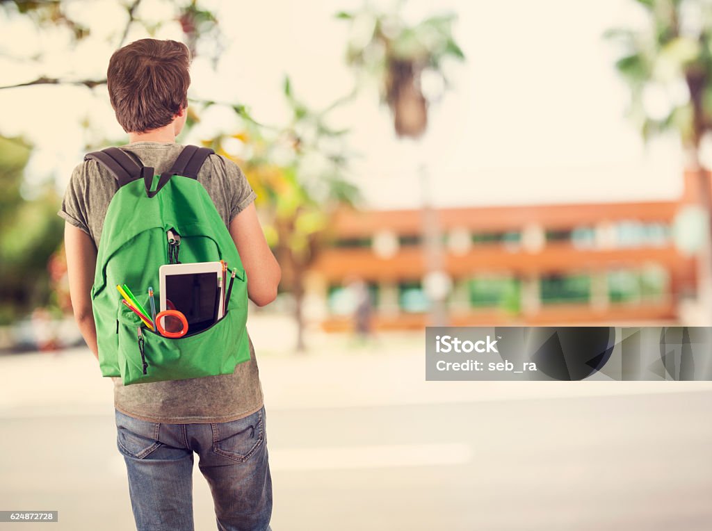 Young student man in campus Walking Stock Photo