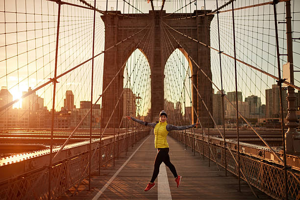 istock Female athlete jumping on the bridge 624872898