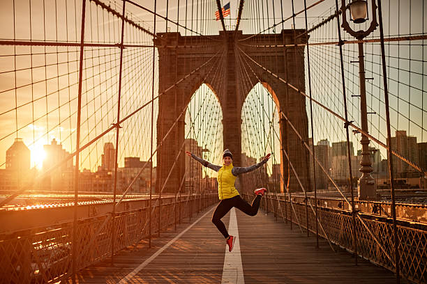 istock Female athlete jumping on the bridge 624873034