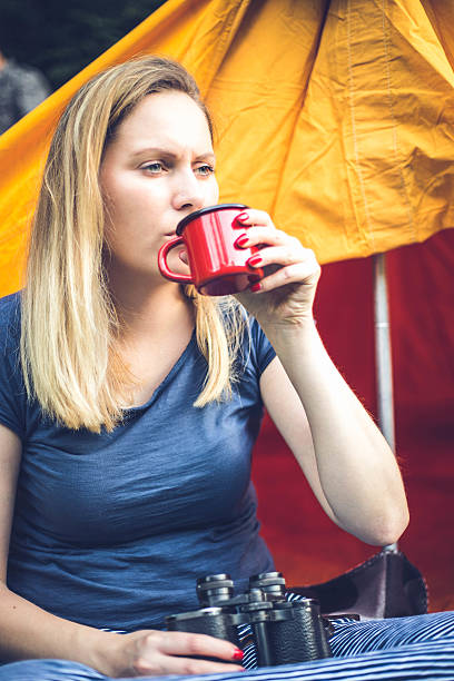istock Hiker woman holding a binoculars 624873430