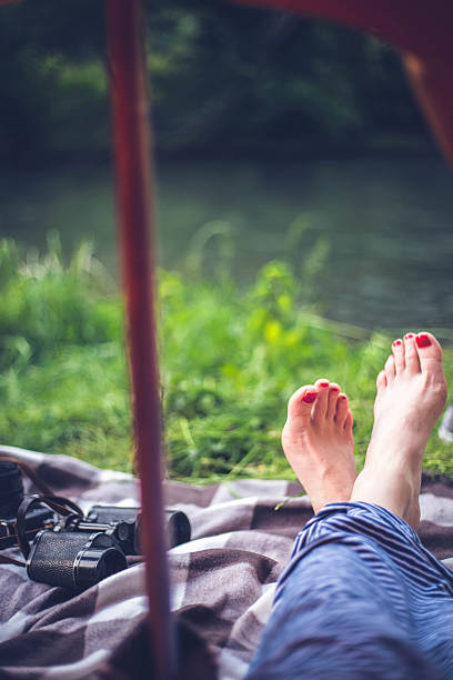 istock Female hiker llying in tent 624873658