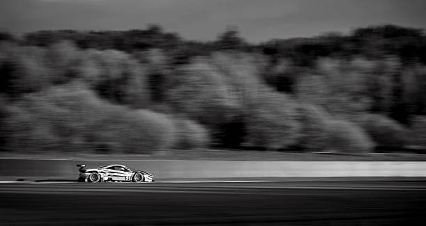 Zandvoort, The Netherlands - June 24, 2012: Red classic Ferrari 365GTB/4 Daytona sports car driving around the race track during the 2012 Italia a Zandvoort day.