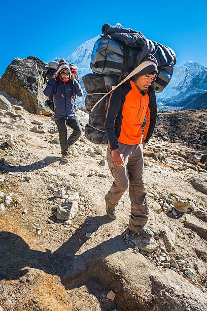 Himalayas Porters Carrying Expedition Kit Everest Base Camp Trail