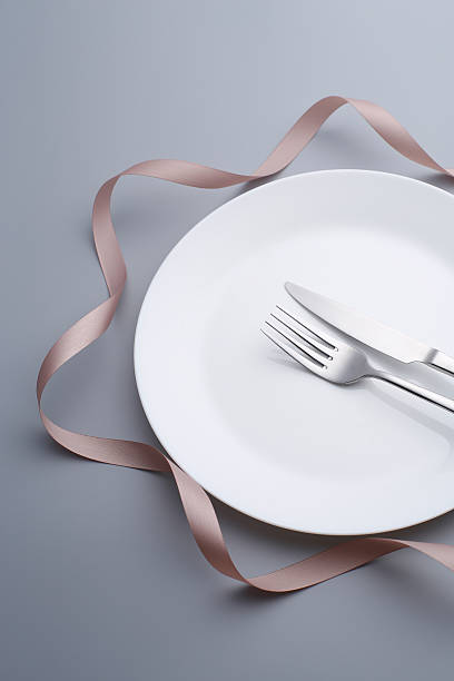 istock Special dinner menu set. Fork,  Knife ribbon flower shape 624878626