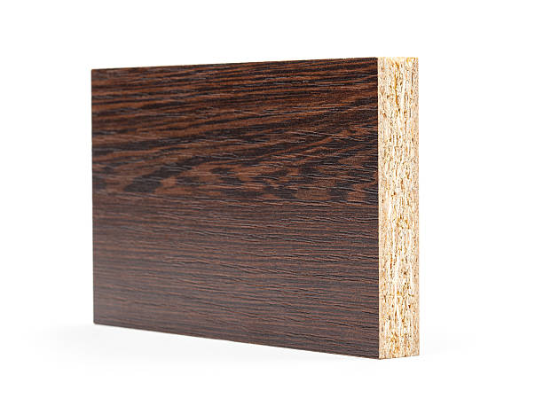 Piece of chipboard with the texture isolated on white background. Piece of chipboard with the texture isolated on white background. Focus on front mdf planks texture stock pictures, royalty-free photos & images