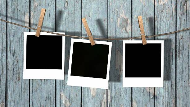 istock blank instant photos hanging on the clothesline 624886724