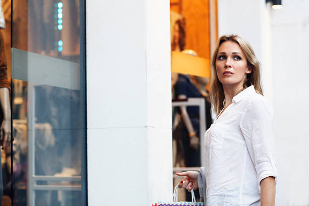 istock Elegant women making shopping 624886804