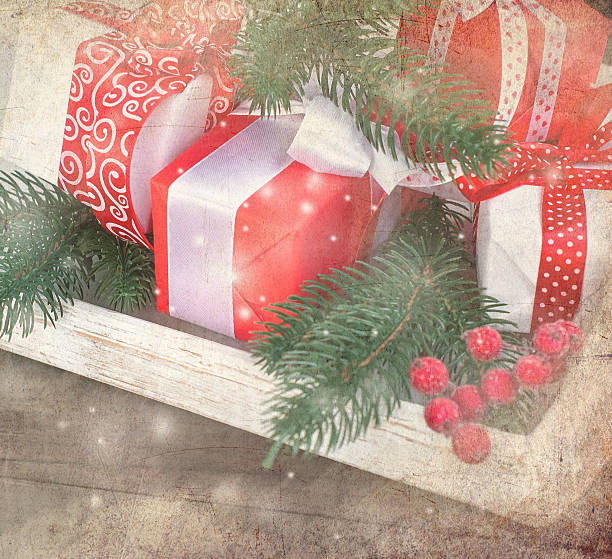 istock Gift box tied with a red ribbon , fir branches,candy 624887074
