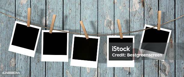 Blank Instant Photos Hanging On The Clothesline Stock Photo - Download Image Now - Arts Culture and Entertainment, Black Color, Blank