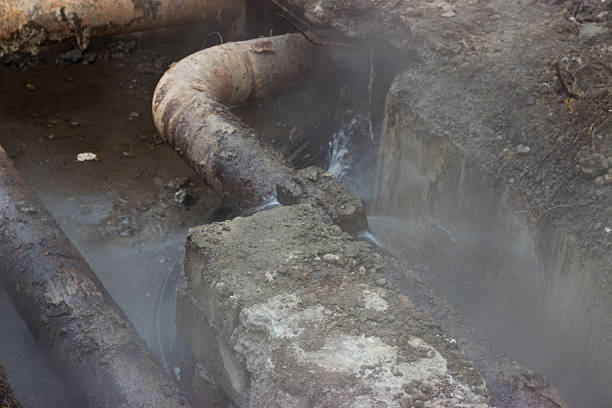 istock Broken old pipes of the heating system 624893894