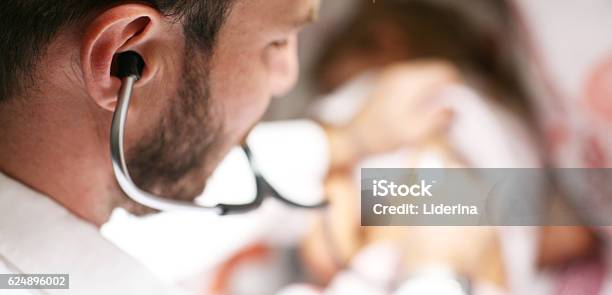 Doctor Checking Lungs Of His Patient Stock Photo - Download Image Now - Doctor, Listening, Medical Exam