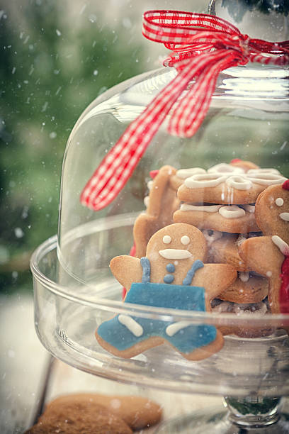 istock Christmas Gingerbread cookie  on glass stand with snow flakes 624896226