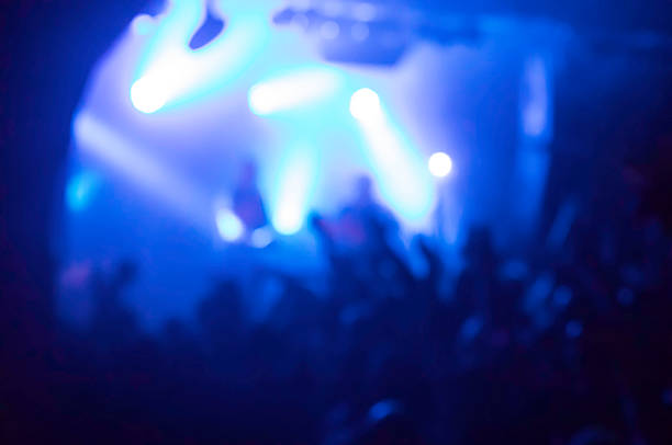 istock defocused colorful stage lights during music concert 624896486