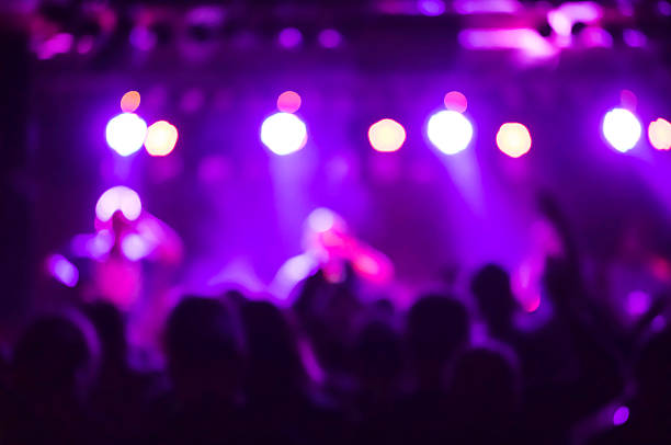 istock defocused colorful stage lights during music concert 624896570