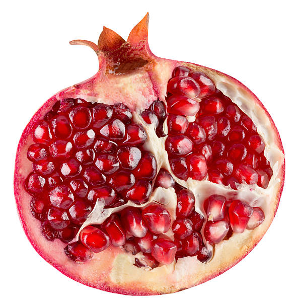 istock half of pomegranate isolated on the white background 624898340