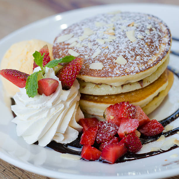 istock pancakes with strawberry  and ice cream 624898604
