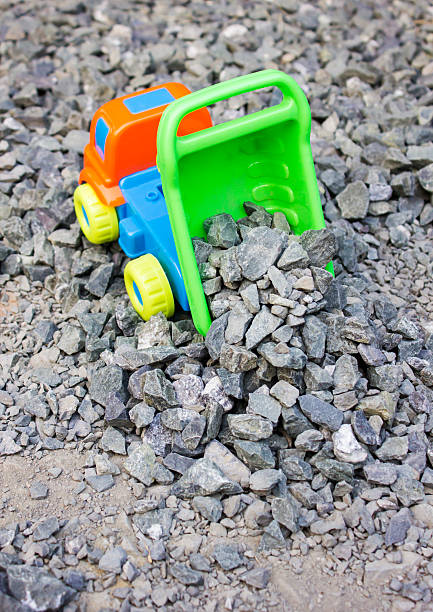 istock tipper truck unload crushed rocks 624904036