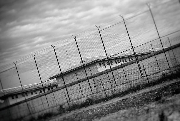 istock Correctional Facility outside the fence. Black and white. 624904902