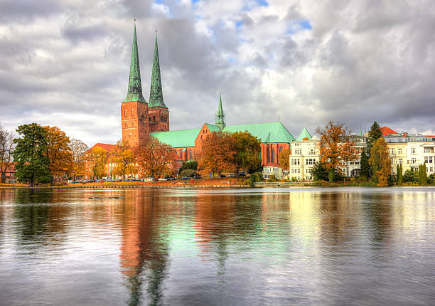 istock Lubeck, Beautiful old town reflected in Trave river, Germany 624905888