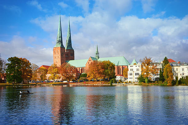 istock Lubeck old town reflected in Trave river, Germany 624905960