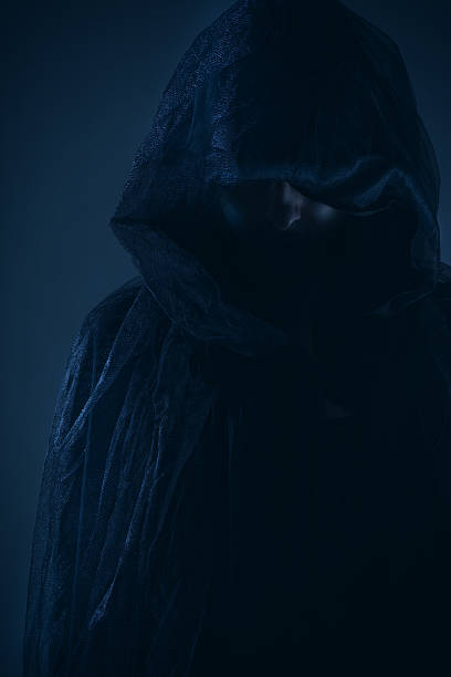istock Mysterious Person Wearing Cloak 624909038