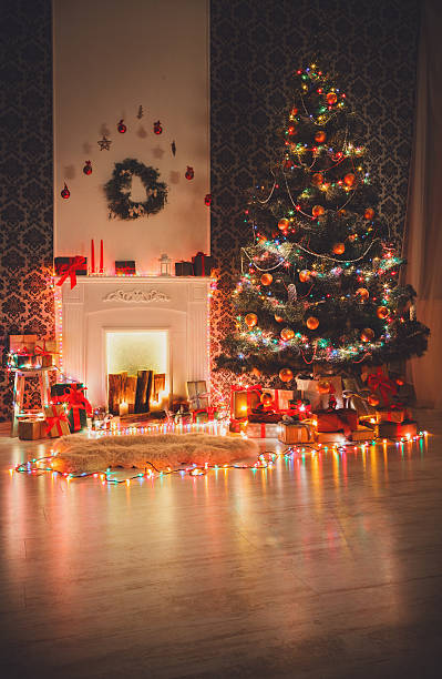 istock Christmas room interior design, decorated tree in garland lights 624911220